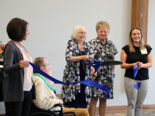 Senior resident ribbon cutting celebration