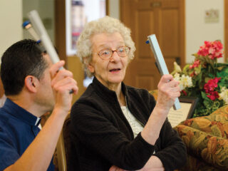 Resident ringing handbell